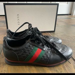 UNISEX Gucci Black Guccissima Leather Web Detail Lace Up Sneakers.